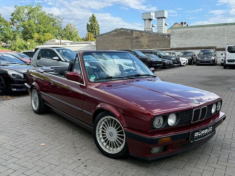 Weinrotmetallic Gebraucht 1990 BMW 318 Cabriolet Sport Line Cabrio | 18.600 € - Bild 1/4