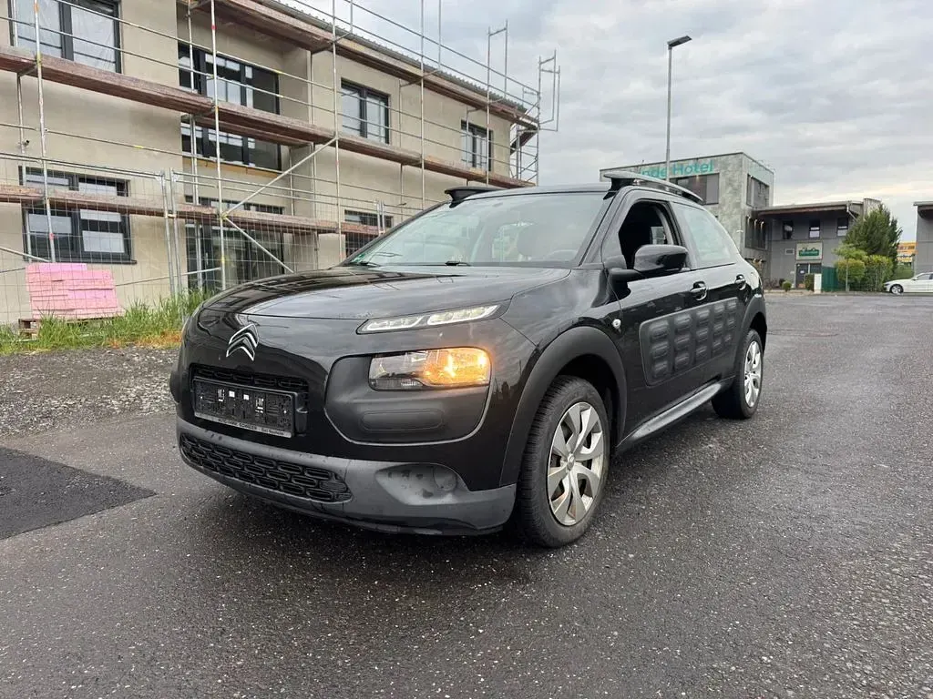 Używany Citroën C4 Feel 82 KM (60 kW) 2014 Czarny Sedan/Limuzyna