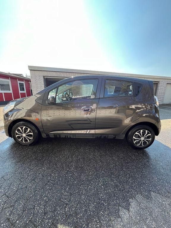 Gebraucht Chevrolet Spark LS 68 PS (50 kW) 2011 Braun Kleinwagen