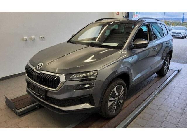 Graphitegrau metallic (metallic) Gebraucht 2022 Skoda Karoq Tour SUV | 25.870 € (Fairer Preis) - Bild 1/4