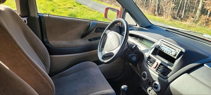 Gebraucht Suzuki Liana 90 PS (66 kW) 2002 Rot Kombi