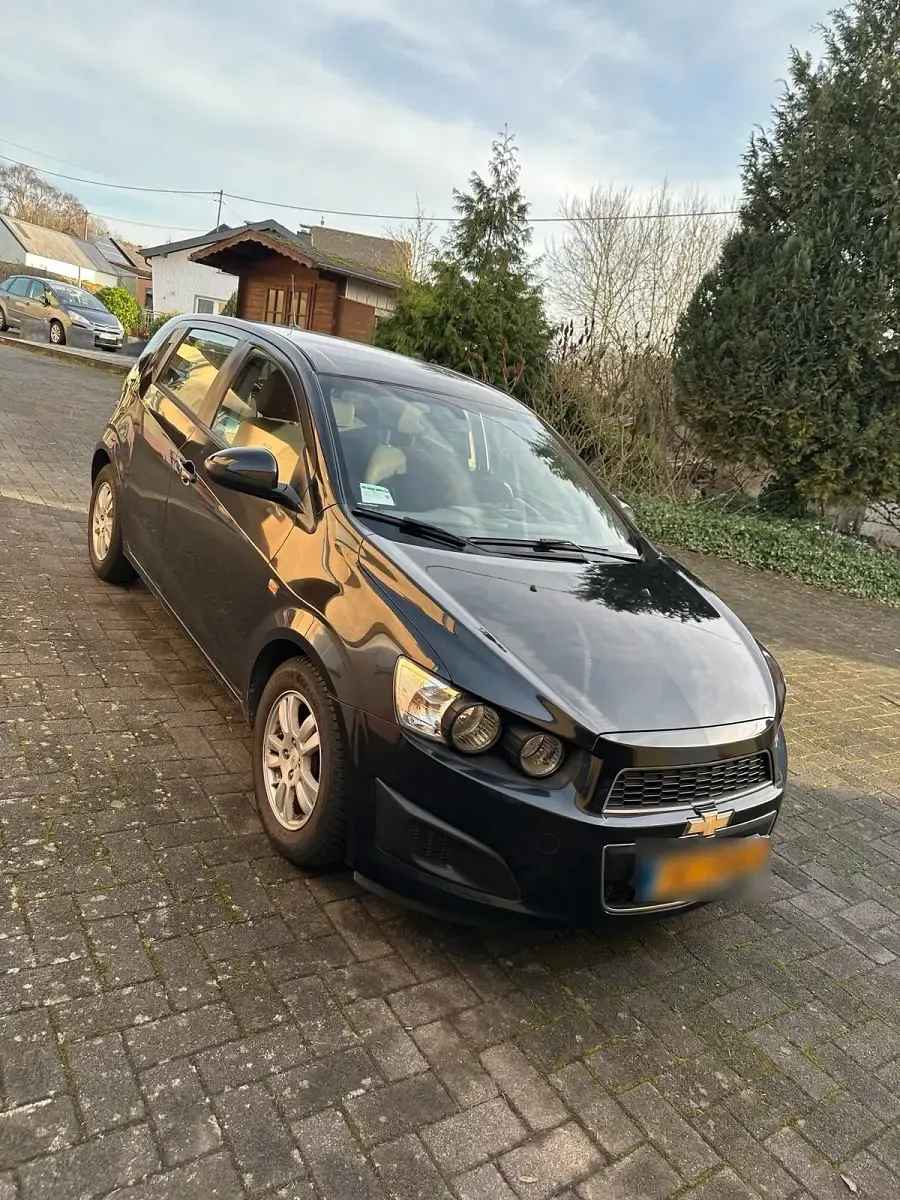 Gebraucht Chevrolet Aveo 101 PS (74 kW) 2013 Schwarz Kleinwagen