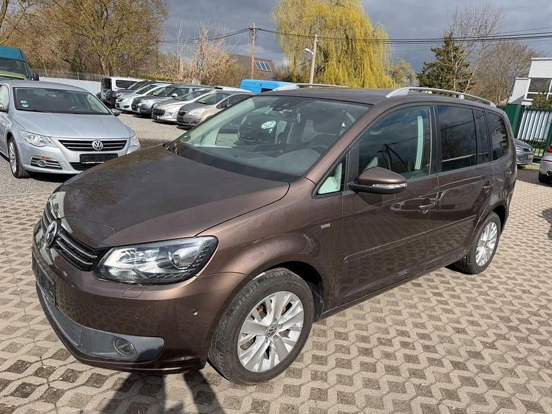 Gebraucht VW Touran Life 140 PS (102 kW) 2013 Braun Van / Kleinbus