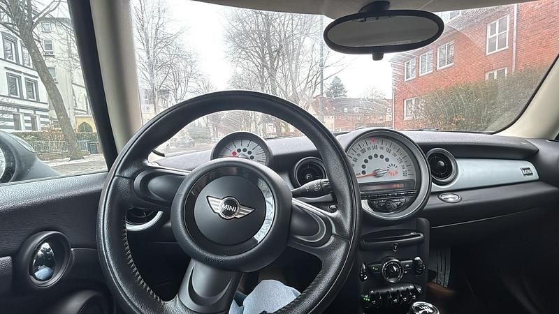 Gebraucht Mini Cooper 75 PS (55 kW) 2013 Schwarz Kleinwagen