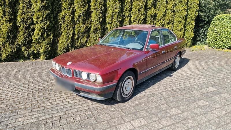 Gebraucht BMW 518 117 PS (86 kW) 1993 Rot Limousine