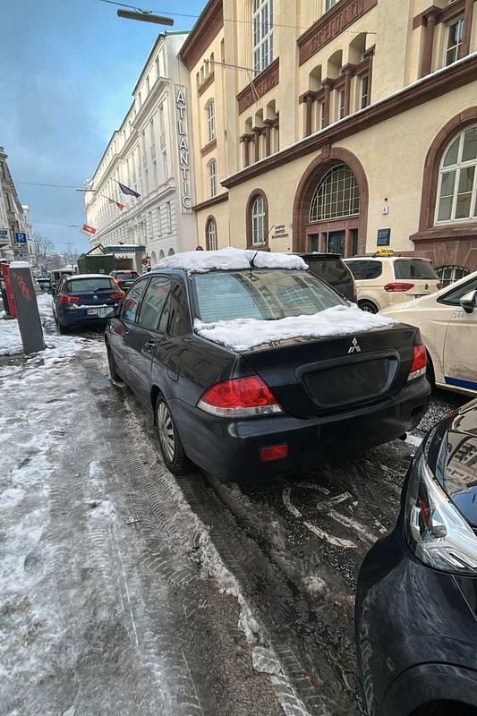 Gebraucht Mitsubishi Lancer Comfort Edition 98 PS (72 kW) 2005 Schwarz Kombi