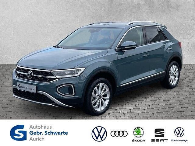 Blau Gebraucht 2024 VW T-Roc Style SUV | 27.390 € (Guter Preis) - Bild 1/4