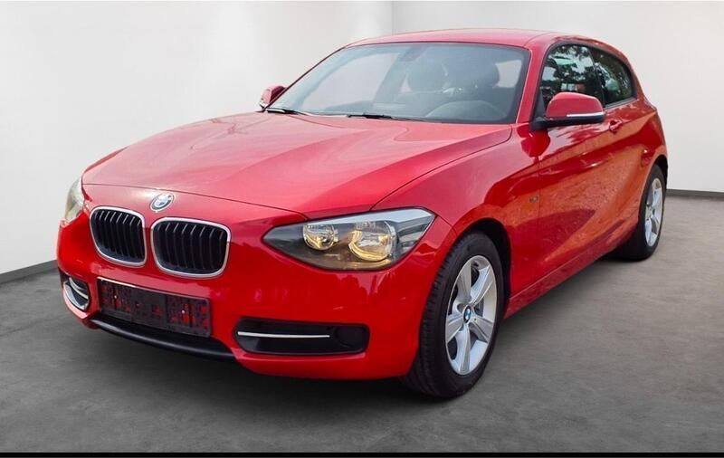 Rot Gebraucht 2014 BMW 114 Sport Line Kleinwagen | 7.395 € (Superpreis) - Bild 1/4