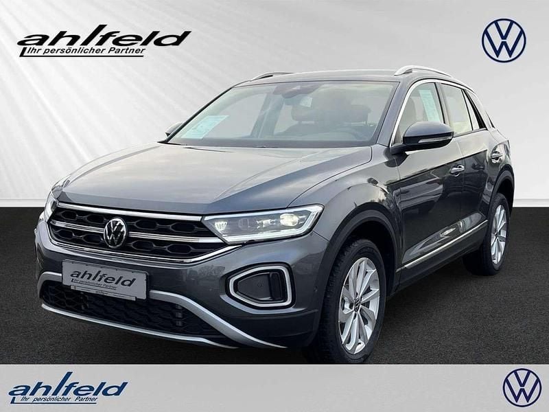 Indiumgrau Gebraucht 2024 VW T-Roc IQ Drive SUV | 39.330 € (Teuer) - Bild 1/4