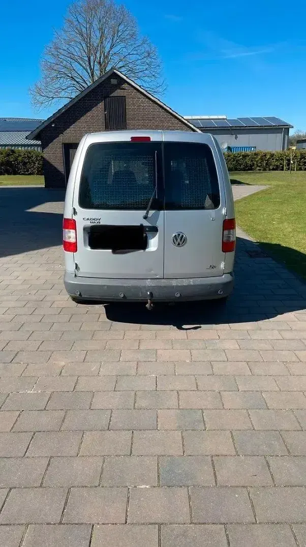 Second-hand VW Caddy Maxi 105 CP (77 kW) 2009 Argintiu Monovolum