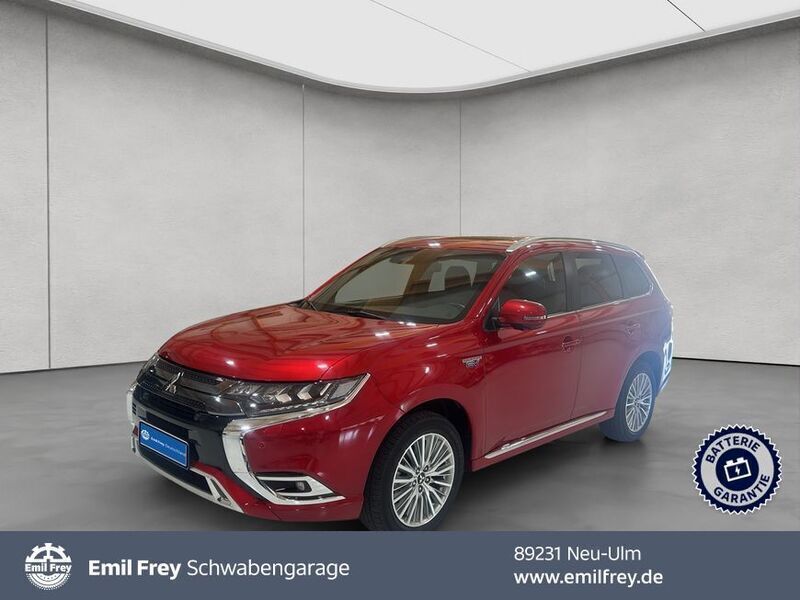 Dynamik rot Gebraucht 2021 Mitsubishi Outlander P-HEV Top SUV | 29.980 € (Teuer) - Bild 1/4