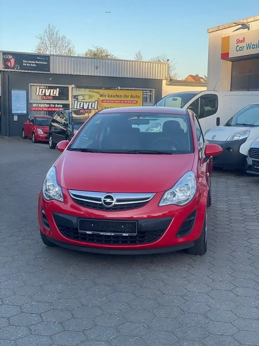 Gebraucht Opel Corsa Active 69 PS (50 kW) 2013 Rot Kleinwagen