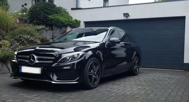 Schwarz Gebraucht 2018 Mercedes C350e AMG line Kombi | 17.400 € (Superpreis) - Bild 1/4