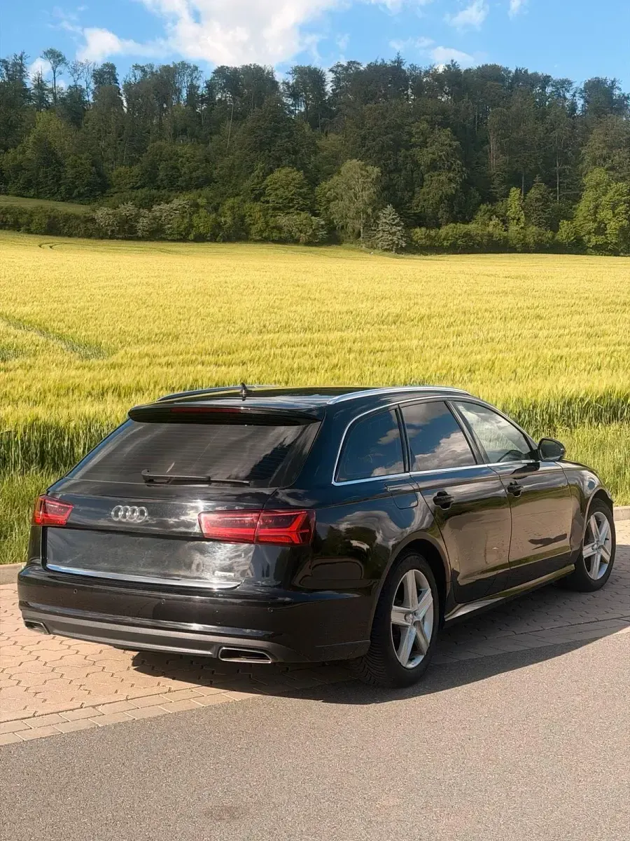 Używany Audi A6 272 KM (200 kW) 2015 Czarny Kombi