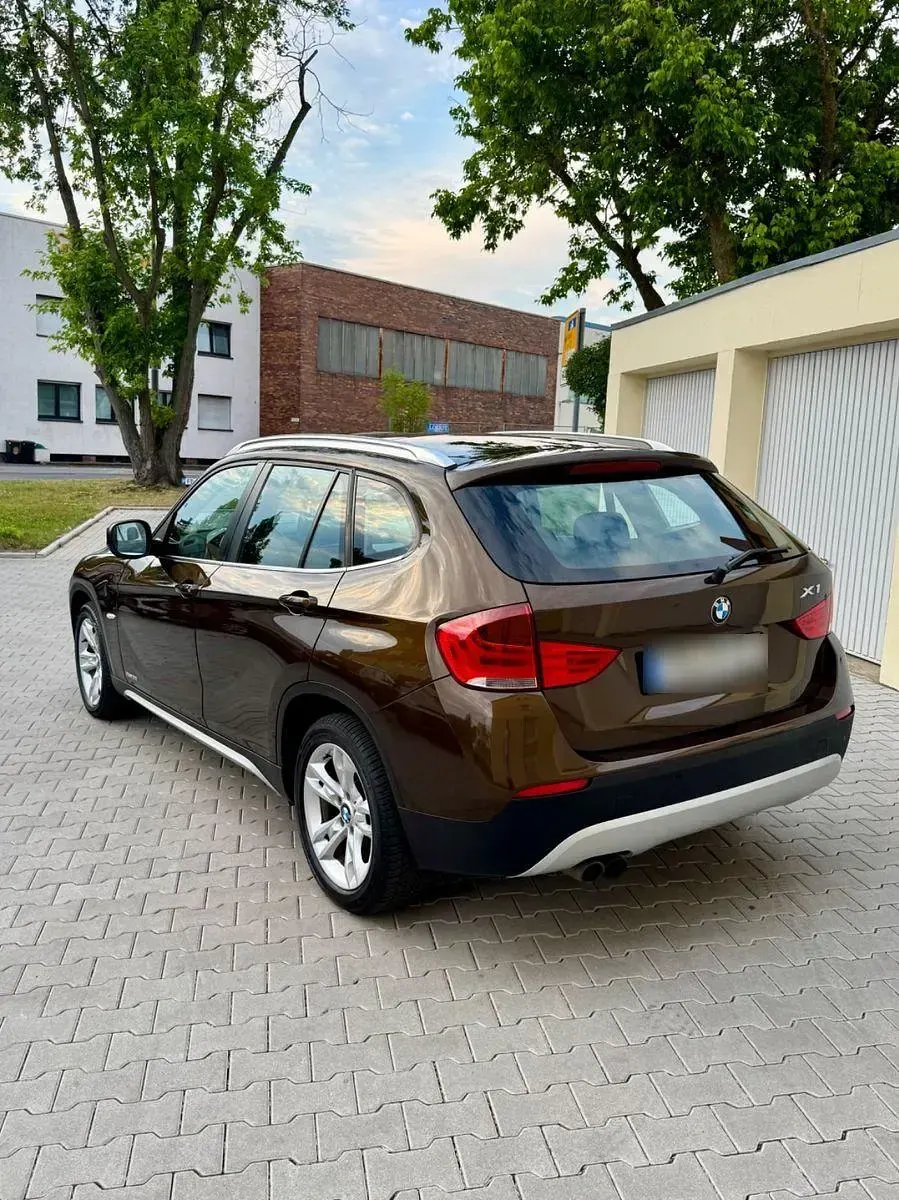 Gebraucht BMW X1 258 PS (189 kW) 2009 Braun SUV