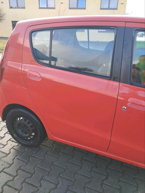 Gebraucht Daihatsu Cuore 65 PS (47 kW) 2008 Rot Kleinwagen
