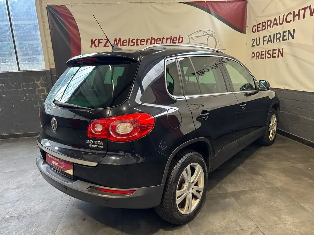 Używany VW Tiguan Team 170 KM (125 kW) 2011 Czarny SUV