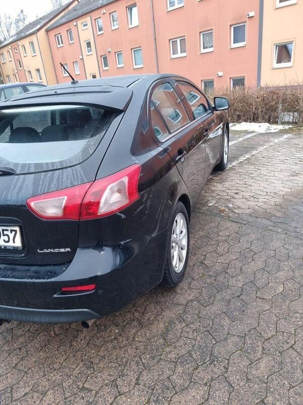 Schwarz Gebraucht 2011 Mitsubishi Lancer Invite Limousine | 4.050 € (Fairer Preis) - Bild 1/4
