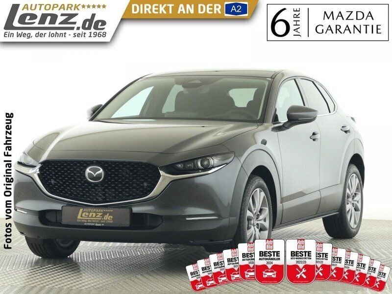 Machine gray Gebraucht 2024 Mazda CX-30 Exclusive-Line SUV | 28.930 € (Fairer Preis) - Bild 1/3