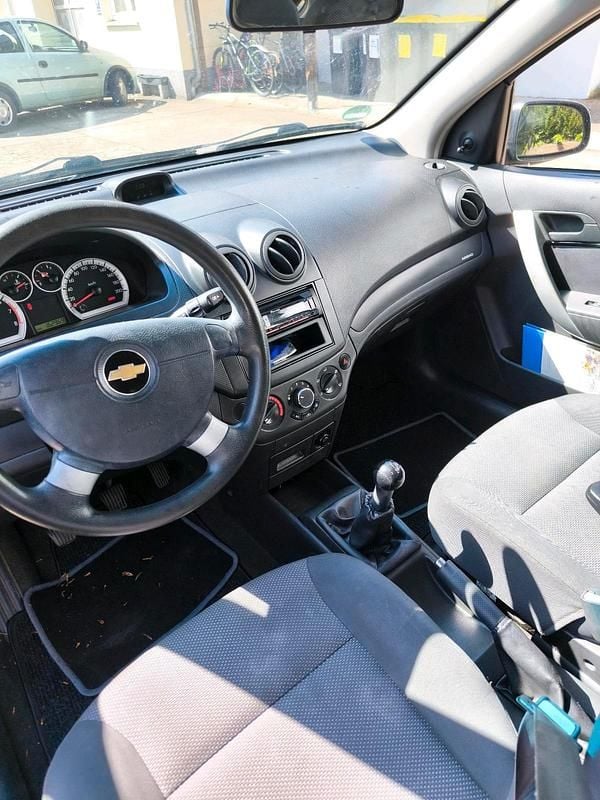 Second-hand Chevrolet Aveo 85 CP (62 kW) 2011 Negru Hatchback