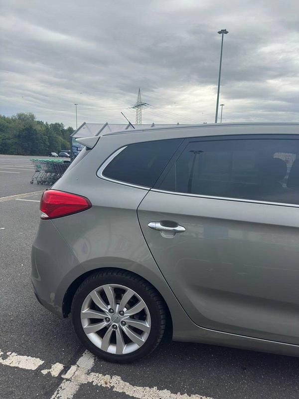 Gebraucht Kia Carens Edition 7 136 PS (100 kW) 2014 Grau Van / Kleinbus