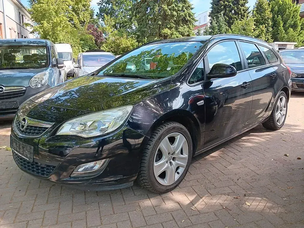 Gebraucht Opel Astra Edition 120 PS (88 kW) 2011 Schwarz Kombi