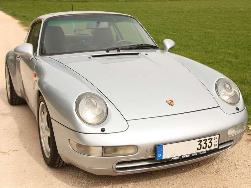 Silber Gebraucht 1995 Porsche 911 Carrera 4 Coupé | 70.000 € - Bild 1/4