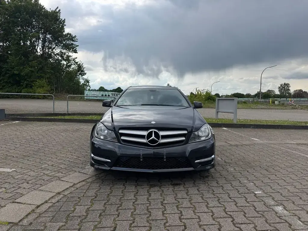 Gebraucht Mercedes C180 AMG line 156 PS (114 kW) 2012 Schwarz Coupé
