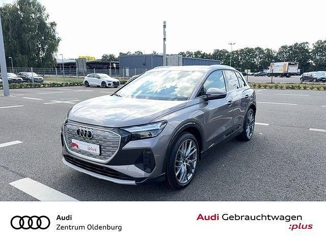 Grau Gebraucht 2022 Audi Q4 e-tron Advanced SUV | 31.478 € (Guter Preis) - Bild 1/4