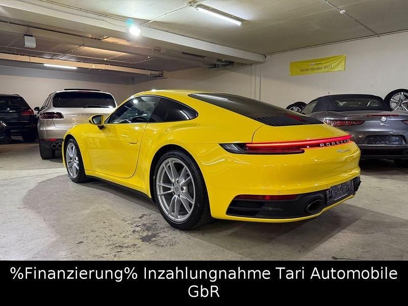 Gelb Gebraucht 2022 Porsche 911 Carrera Coupé | 118.980 € (Guter Preis) - Bild 1/4