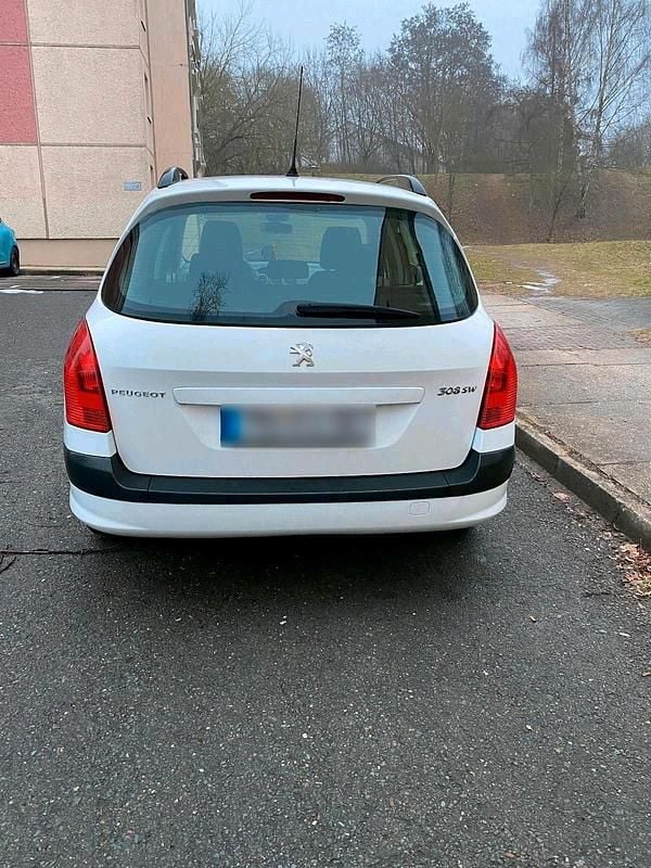 Gebraucht Peugeot 308 105 PS (77 kW) 2012 Weiß Kombi