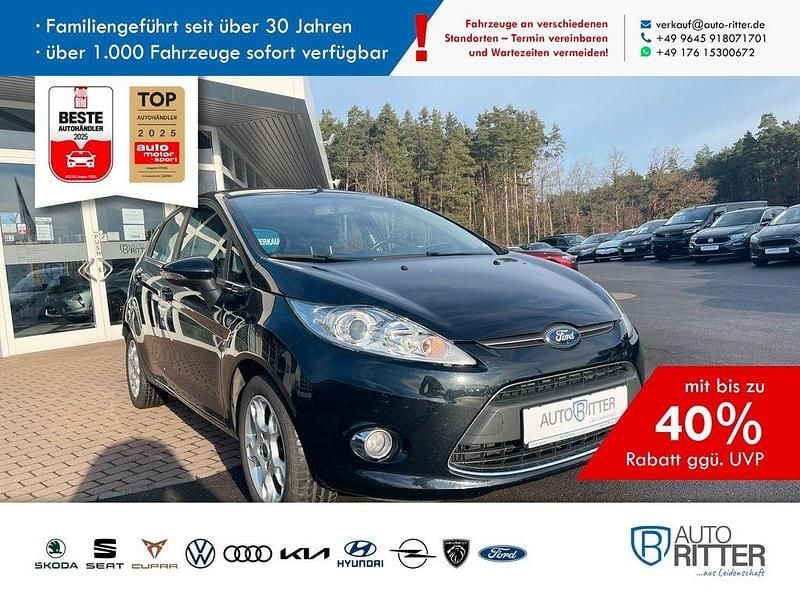 Pantherschwarz metallic (metallic) Gebraucht 2012 Ford Fiesta Titanium Kleinwagen | 3.990 € (Fairer Preis) - Bild 1/4