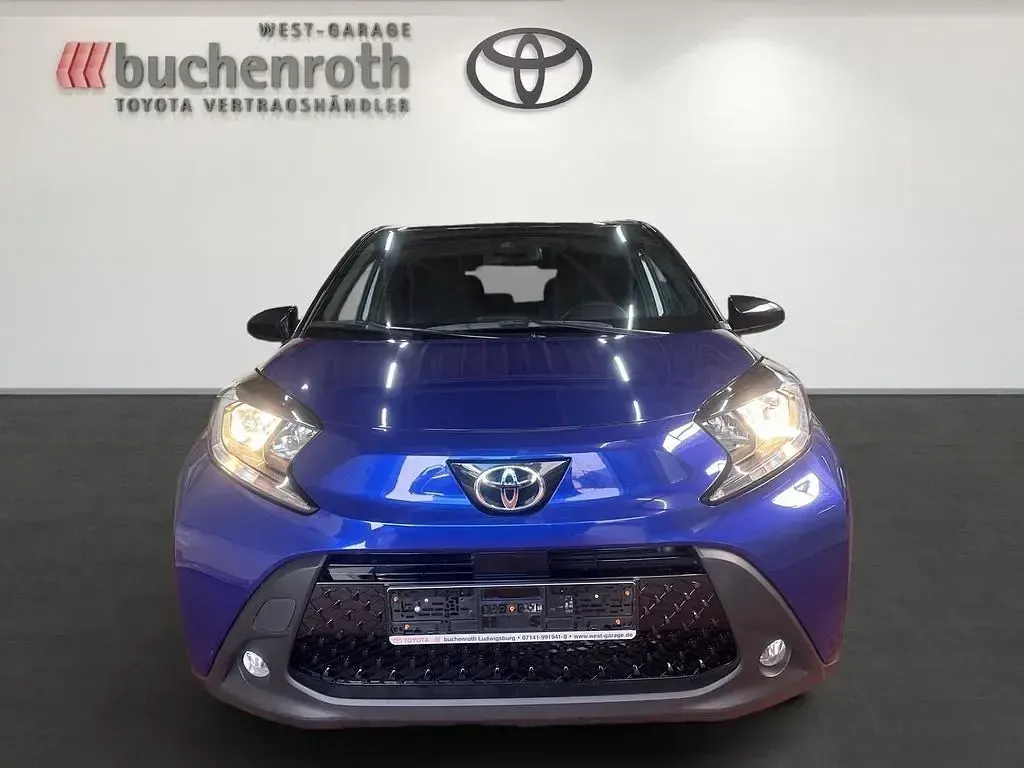 Gebraucht Toyota Aygo X Pulse 72 PS (52 kW) 2023 Juniper blue (8y8)/ black mica (209) SUV