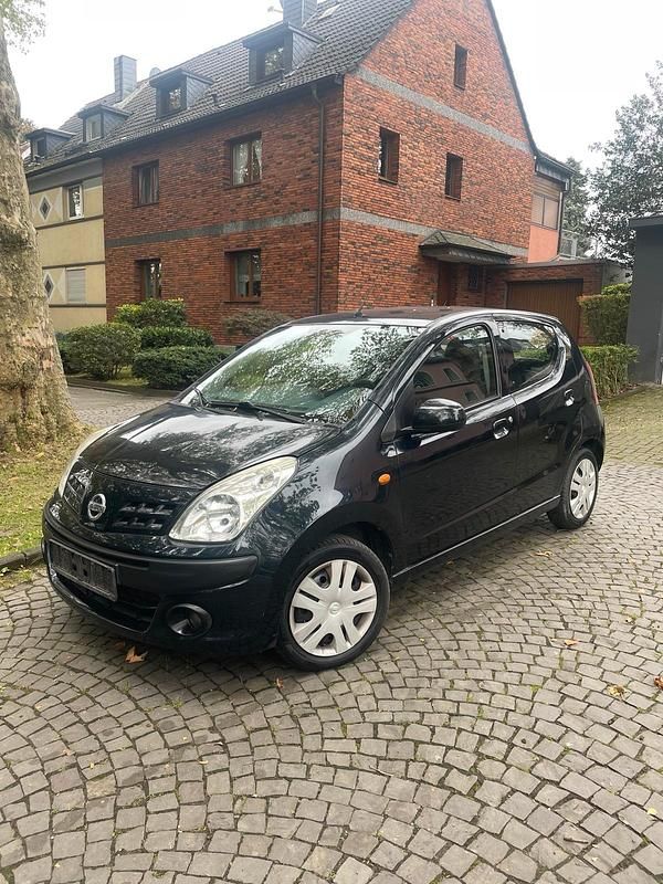 Schwarz Gebraucht 2010 Nissan Pixo Acenta Kleinwagen | 1.799 € (Fairer Preis) - Bild 1/4