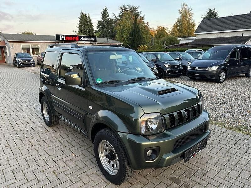 Grün Gebraucht 2018 Suzuki Jimny Comfort SUV | 19.499 € (Superpreis) - Bild 1/4