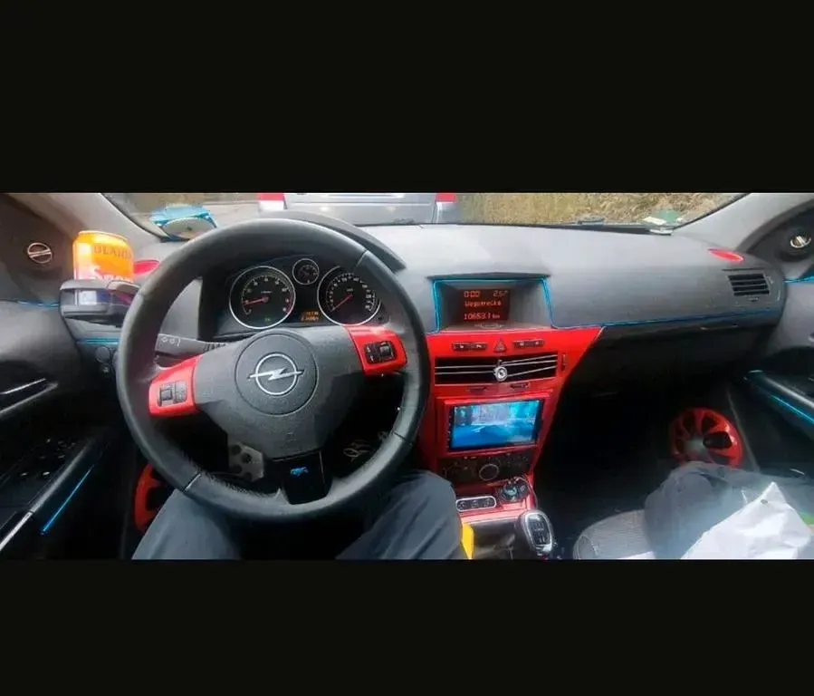 Używany Opel Astra 103 KM (75 kW) 2005 Czerwony Coupe