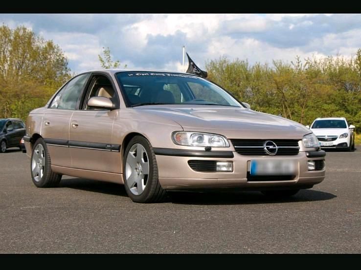 Gold Gebraucht 1997 Opel Omega Limousine | 5.599 € - Bild 1/4