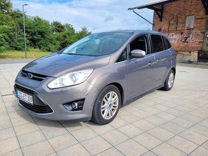 Grau Gebraucht 2012 Ford Grand C-Max Titanium Van / Kleinbus | 8.699 € (Teuer) - Bild 1/4