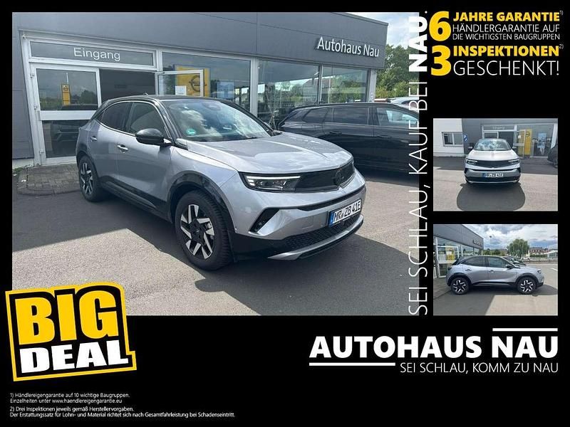 Lack grau artense/typ aussenve Gebraucht 2024 Opel Mokka-e SUV | 38.990 € - Bild 1/4
