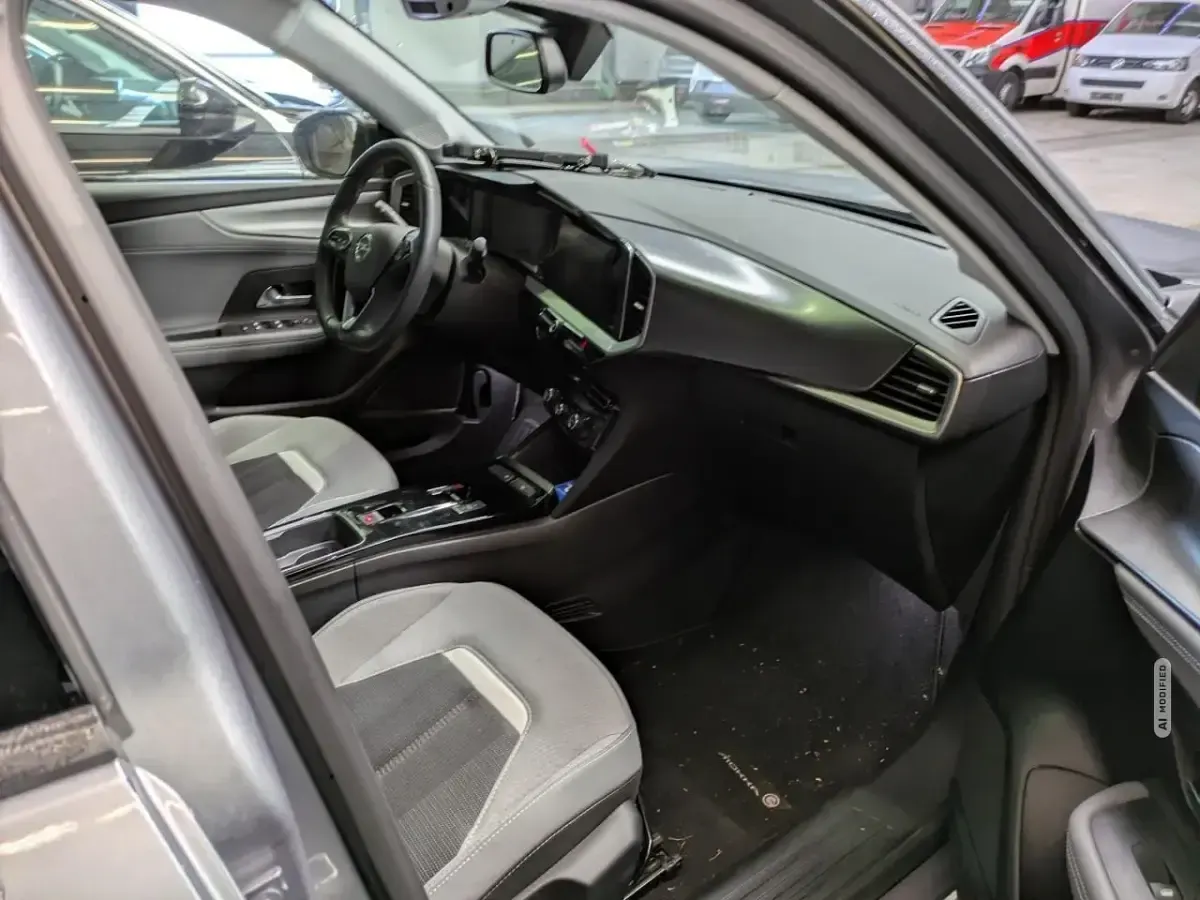 Gebraucht Opel Mokka-e Elegance 100 kW (136 PS) 2023 Grau metallic SUV