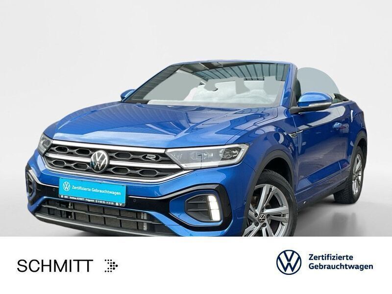 Ravennablau metallic/schwarz Gebraucht 2024 VW T-Roc Cabriolet R-line Cabrio | 31.899 € (Guter Preis) - Bild 1/3