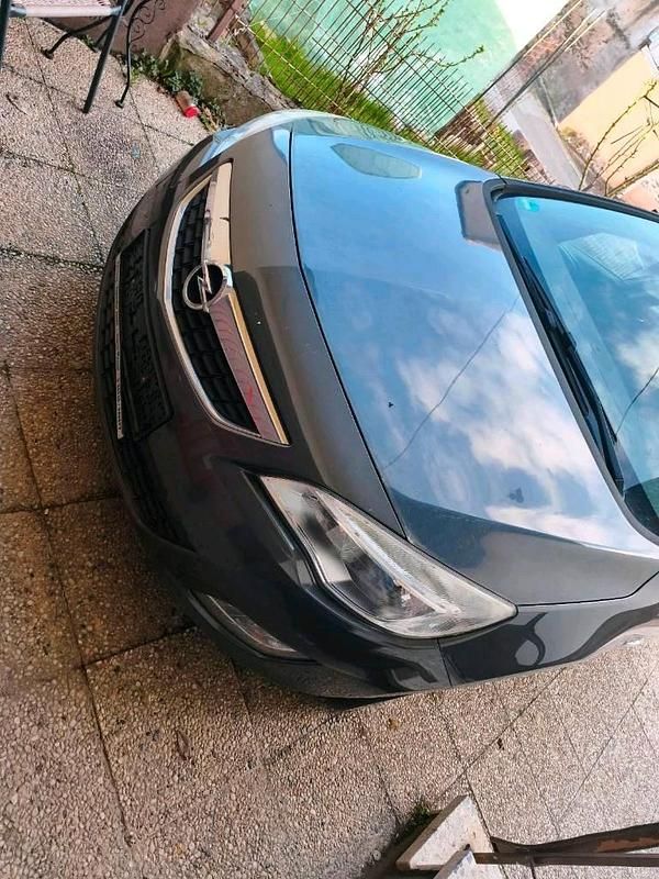 Second-hand Opel Astra 120 CP (88 kW) 2011 Gri Break