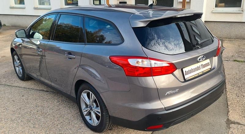 Gebraucht Ford Focus Champions Edition 125 PS (91 kW) 2013 Braun Kombi