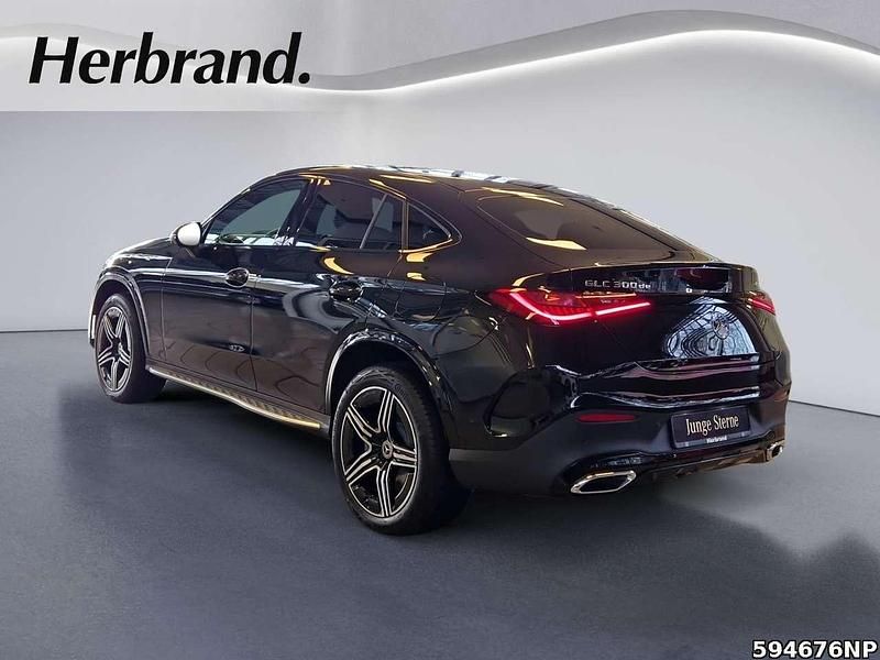 Gebraucht Mercedes GLC300e AMG 333 PS (244 kW) 2024 Metalliclack obsidianschwarz Coupé