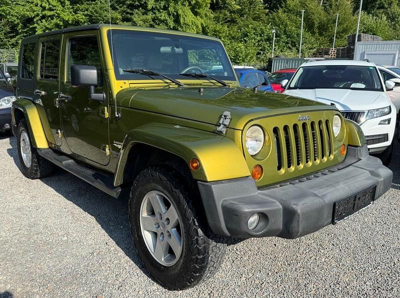 Grün Gebraucht 2007 Jeep Wrangler Unlimited Sahara SUV | 12.490 € (Guter Preis) - Bild 1/4