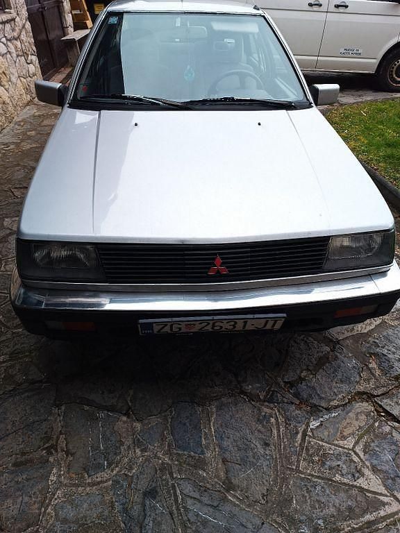 Silber Gebraucht 1987 Mitsubishi Lancer Limousine | 4.900 € - Bild 1/4