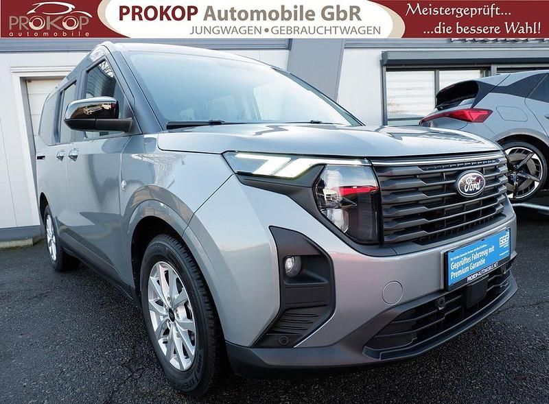Gebraucht Ford Tourneo Courier Titanium 125 PS (91 kW) 2024 Grau Van / Kleinbus
