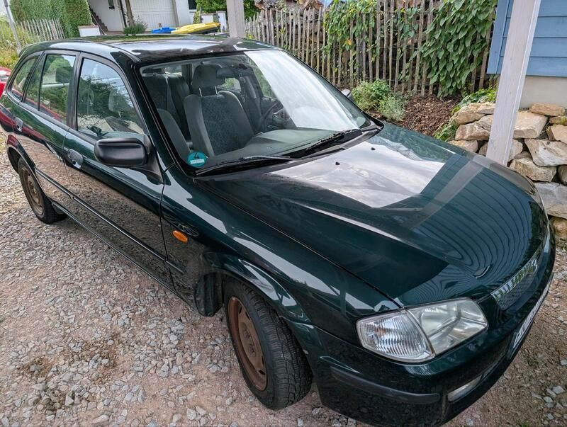Grün Gebraucht 1998 Mazda 323 Kleinwagen | 1.500 € (Fairer Preis) - Bild 1/4