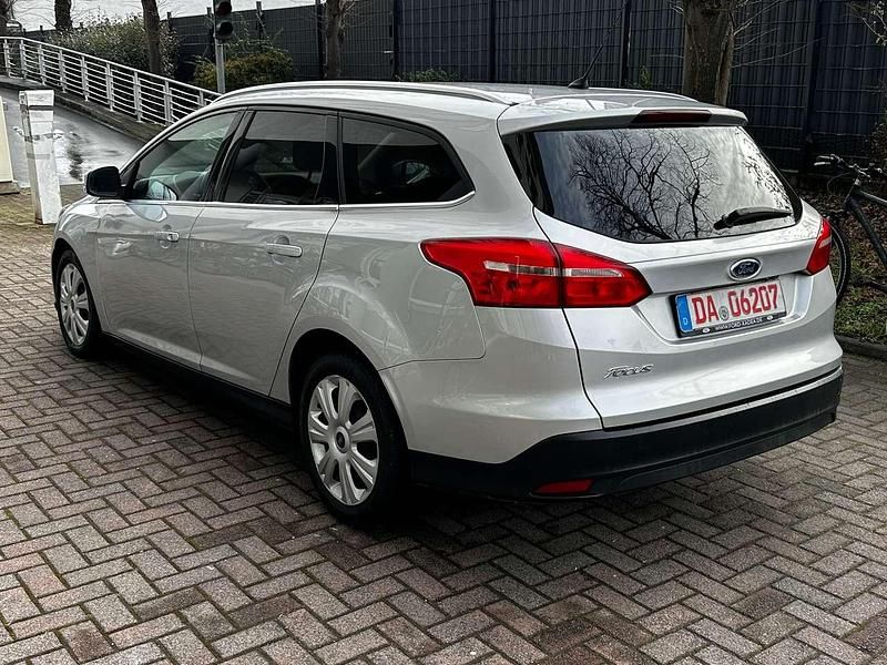 Gebraucht Ford Focus Titanium 120 PS (88 kW) 2014 Polarsilber metallic Kombi