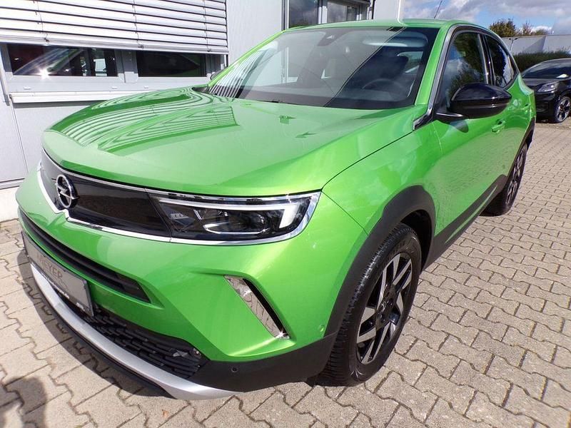Grün Gebraucht 2021 Opel Mokka Elegance SUV | 17.950 € (Fairer Preis) - Bild 1/3